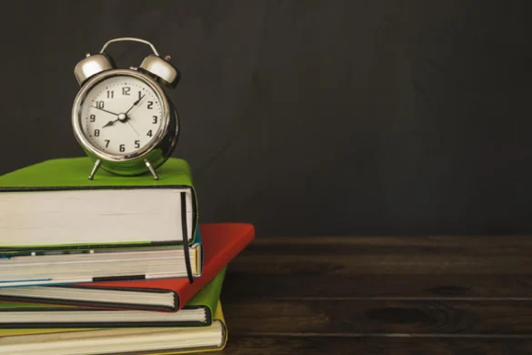 AA HL exam countdown study planning with books and alarm clock